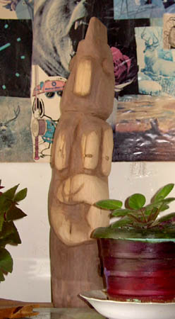 A table top totem on book shellf